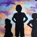 kids silhouette on the sunset